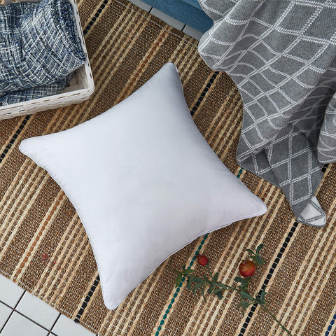 Oubonun pair styled on sofa highlighting cohesive look and immediate room refresh