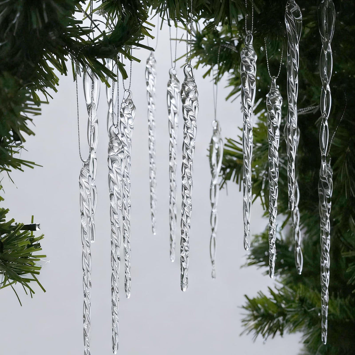 OuMuaMua front packaging showing 64-piece clear glass icicle set, premium look