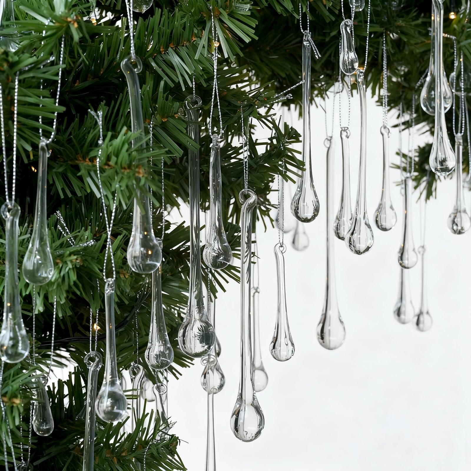 OuMuaMua front display of clear teardrops showing elegant sparkle and cohesive set