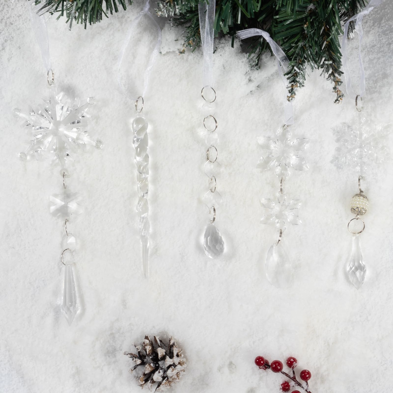OuMuaMua ornaments arranged in a winter table centerpiece creating frosted holiday ambiance