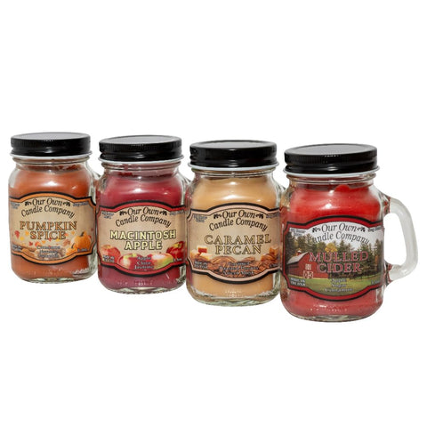 Our Own Candle Company front view of four mini mason jar candles showing fall scents