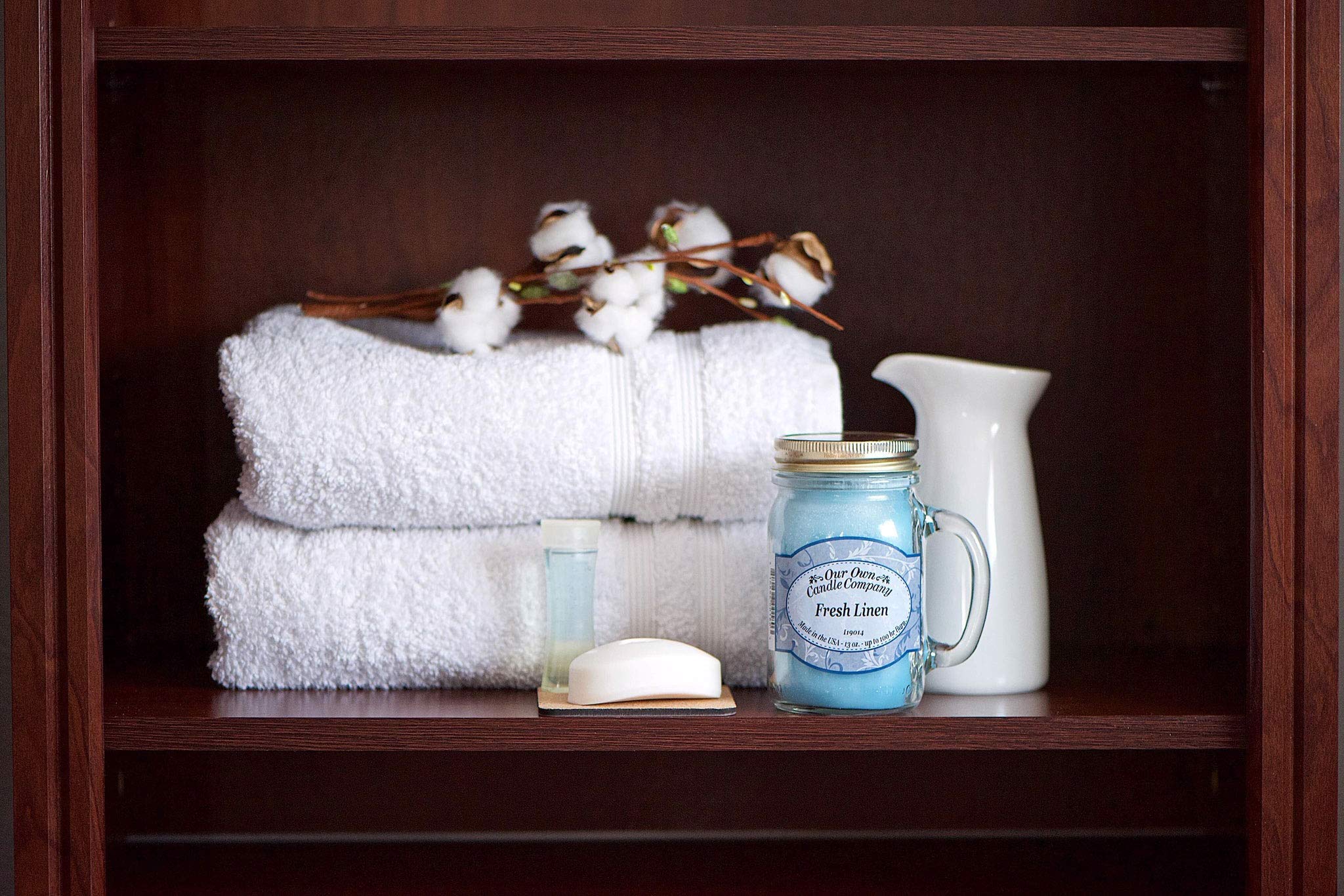Our Own Candle Company four-pack displayed in box ready for gifting and storage