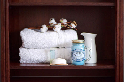 Our Own Candle Company four-pack displayed in box ready for gifting and storage