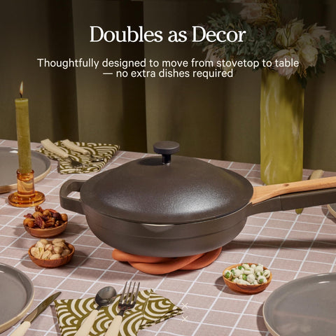 Our Place Always Pan 2.0 next to utensils and bowls to show real-life size and scale