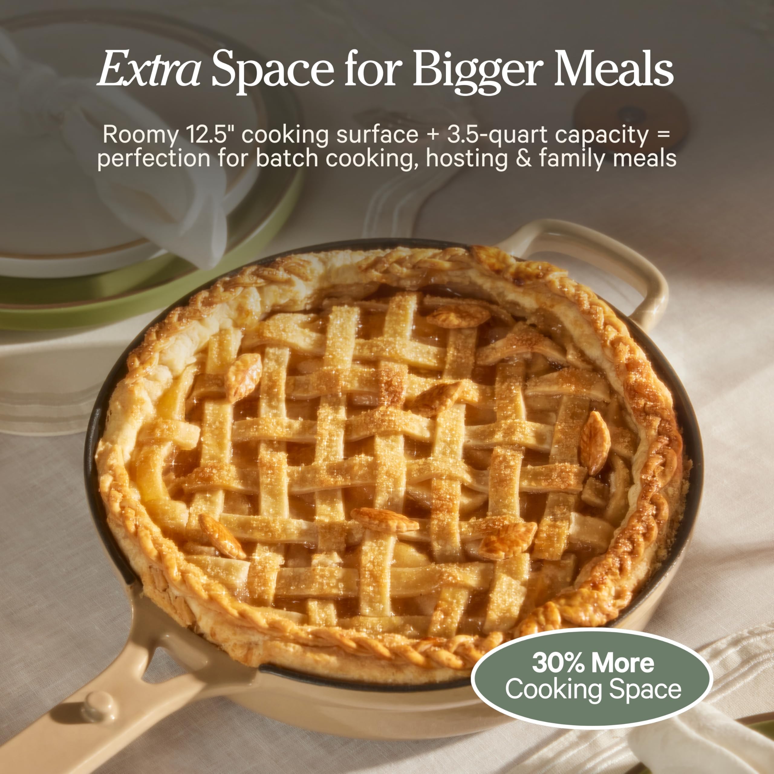 Our Place pan beside standard pot illustrating larger 12.5-inch scale benefit