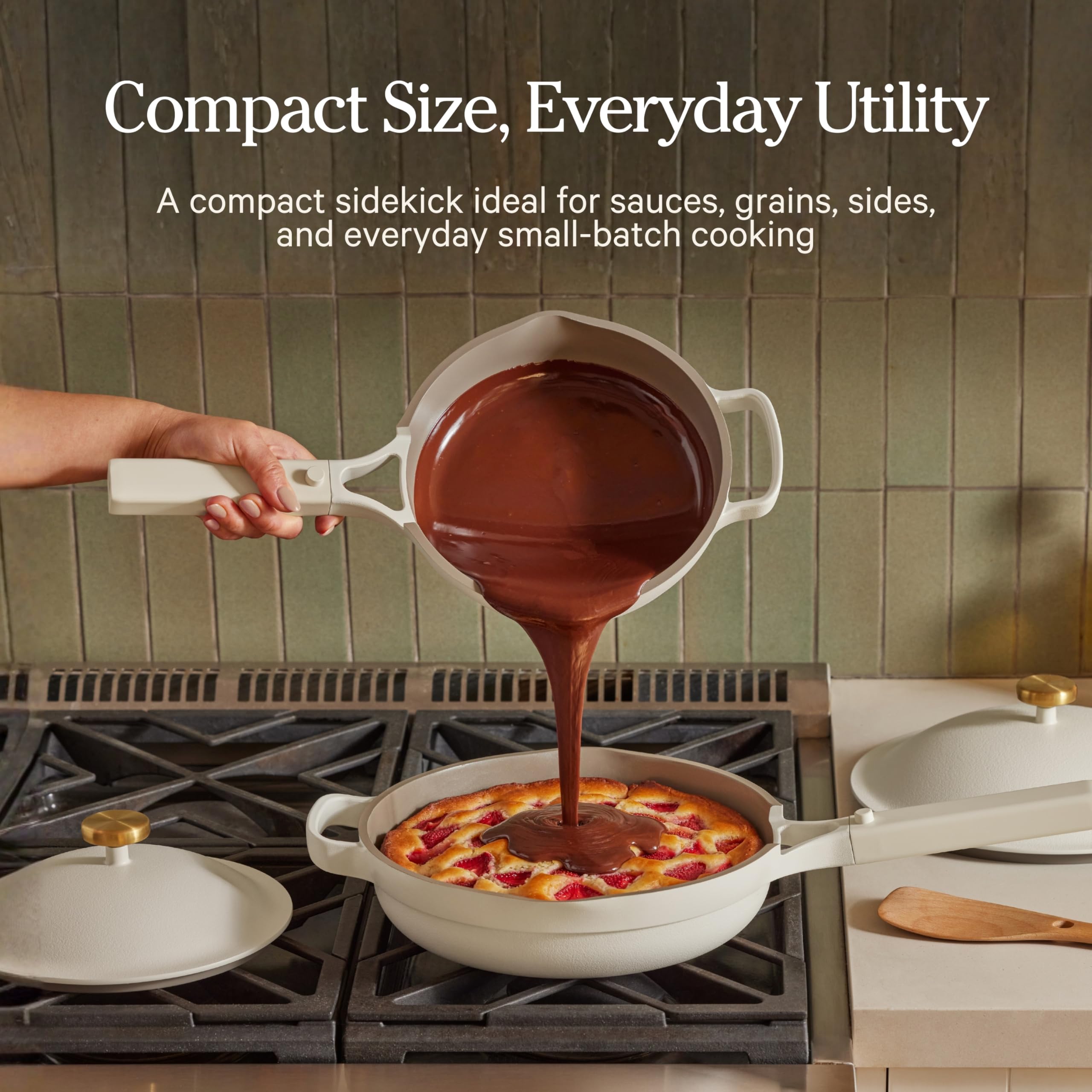 Our Place size comparison with hand to illustrate lightweight 3.3-lb portability
