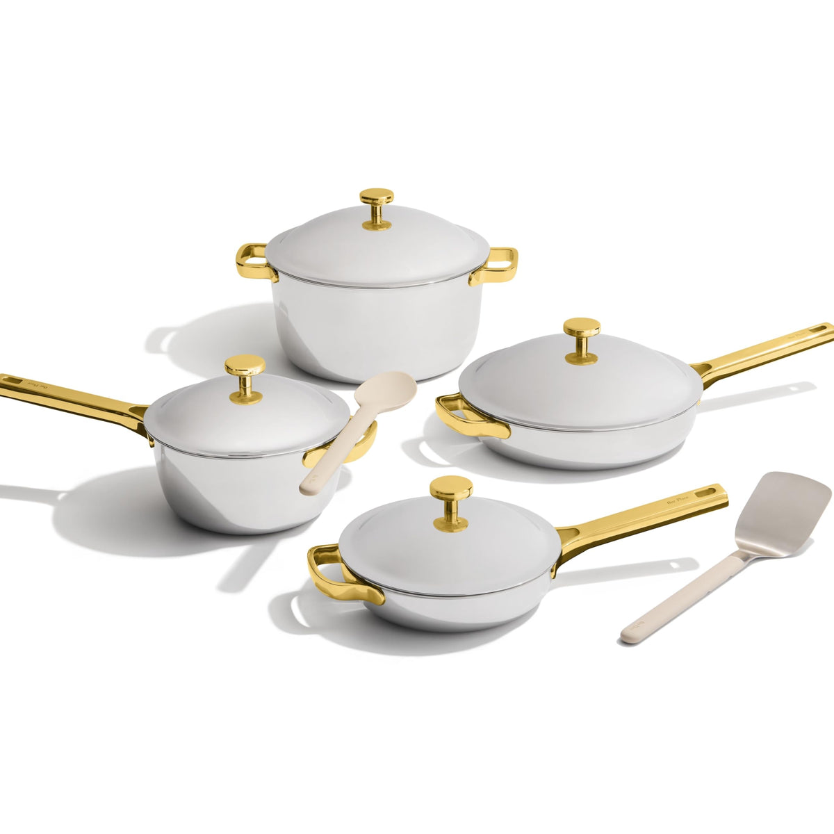 Our Place cookware front packaging showing full 10-piece set and benefits