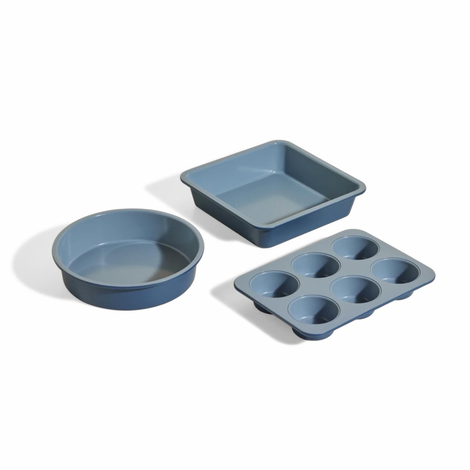 Our Place front view of the three-piece set showing pans and packaging, versatile baking solution