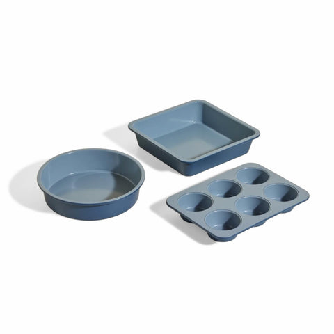 Our Place front view of the three-piece set showing pans and packaging, versatile baking solution
