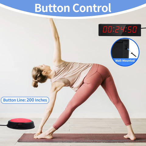 Ousmile mounted on gym wall providing clear interval cues for classes