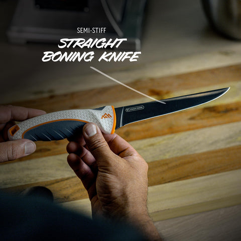 OUTDOOR EDGE blade collection laid out showing varied profiles and cutting surfaces for tasks