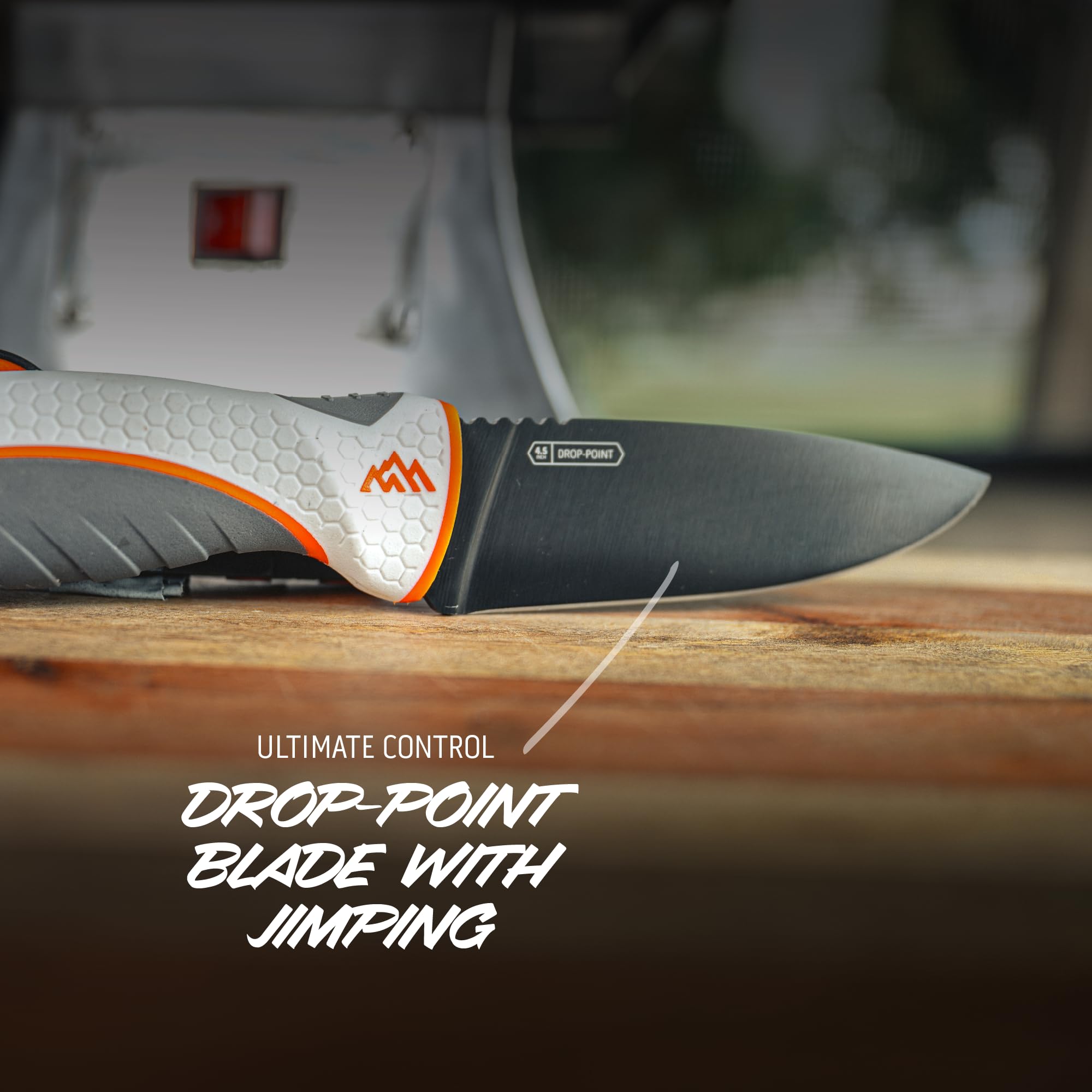 OUTDOOR EDGE boning knife separating meat from bone to showcase precise professional performance
