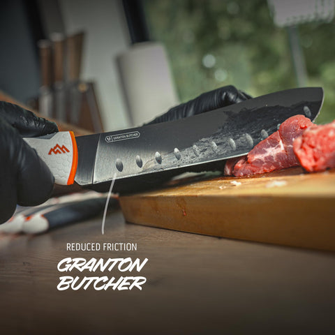 OUTDOOR EDGE close-up of rubberized Triple Shot TPR handle demonstrating secure comfortable grip