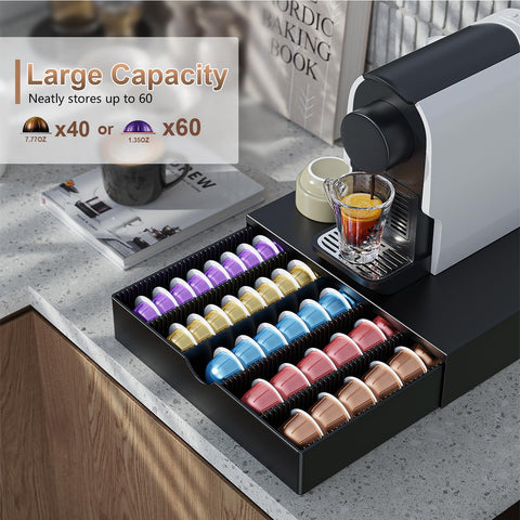 OUTIOE size comparison next to coffee machine demonstrating compact under-machine fit
