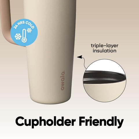 Owala FreeSip seated in a car cup holder demonstrating travel-friendly, leak-resistant design