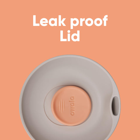Owala SmoothSip held in hand during commute showing spill-free travel benefit