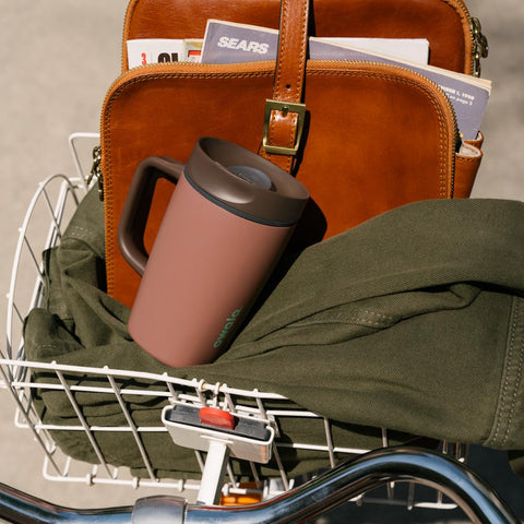 Owala SmoothSip in commute scene showing convenient, leak-proof use