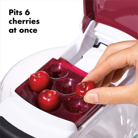 OXO adjustable base positioned over a mixing bowl for low-mess prep