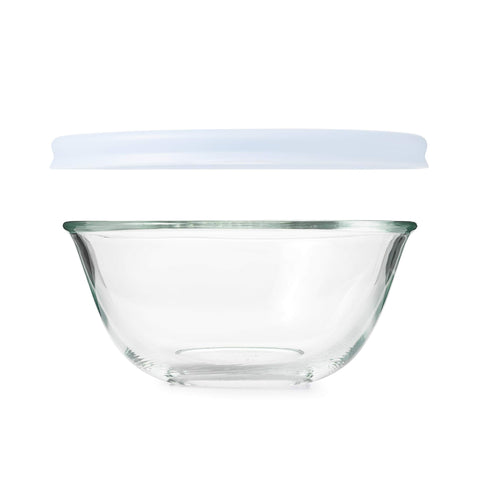 OXO bowl being used to mix ingredients, demonstrating spill-reducing sidewalls