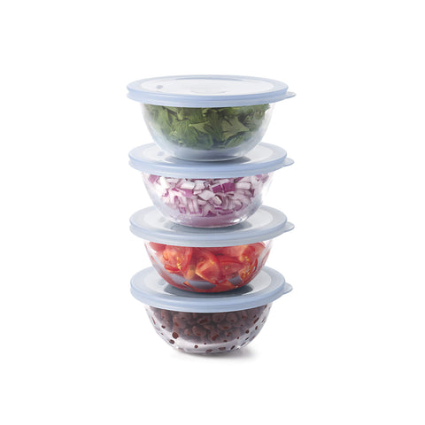 Nested OXO bowls in a cabinet to show space-saving storage and tidy organization