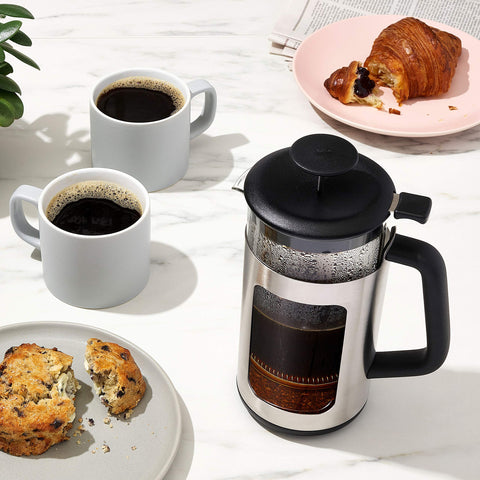OXO Brew pouring action into cup illustrating drip-free spout and smooth pour