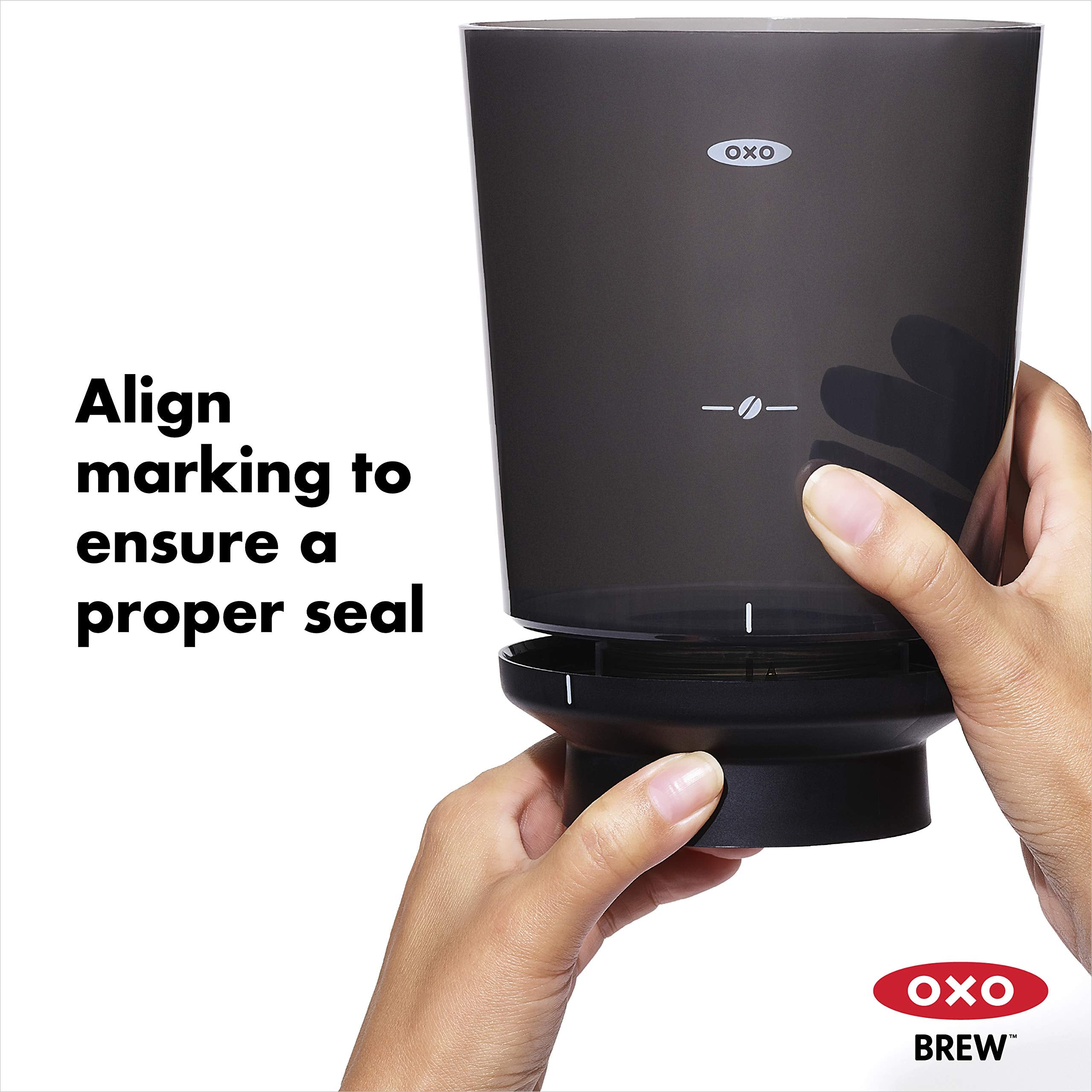 OXO brewer next to a smartphone scale comparison showing small size advantage