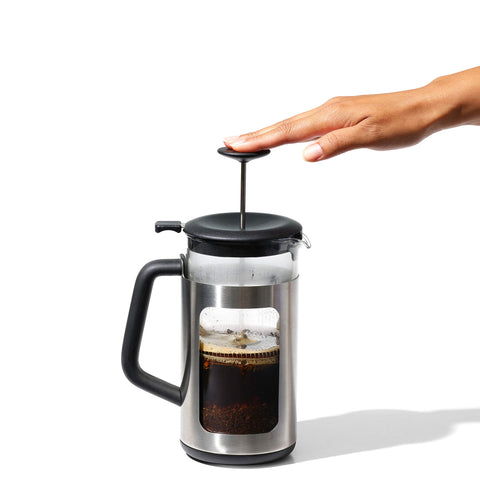 OXO Brew next to a standard mug for size comparison and portion context