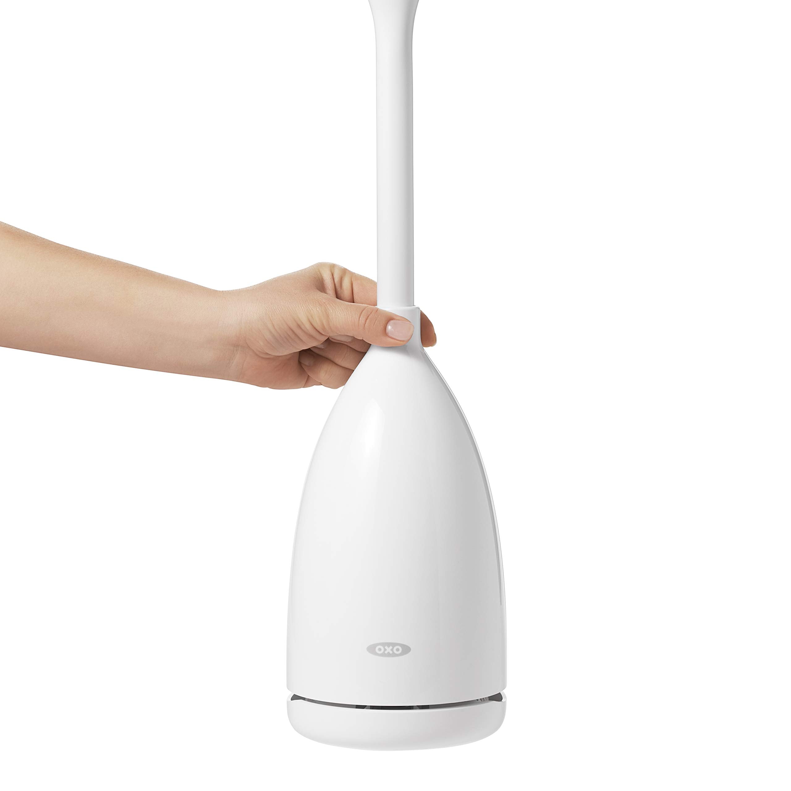 OXO canister open during use showing hands-free, easy brush access