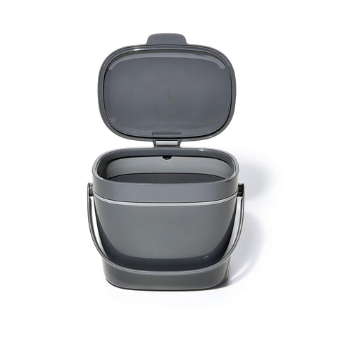 OXO compost bin next to fruit for scale and practical kitchen fit