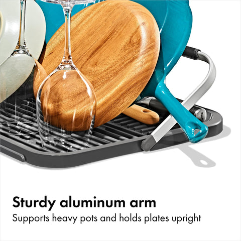 OXO dish rest arm holding plates upright for secure, vertical drying benefit