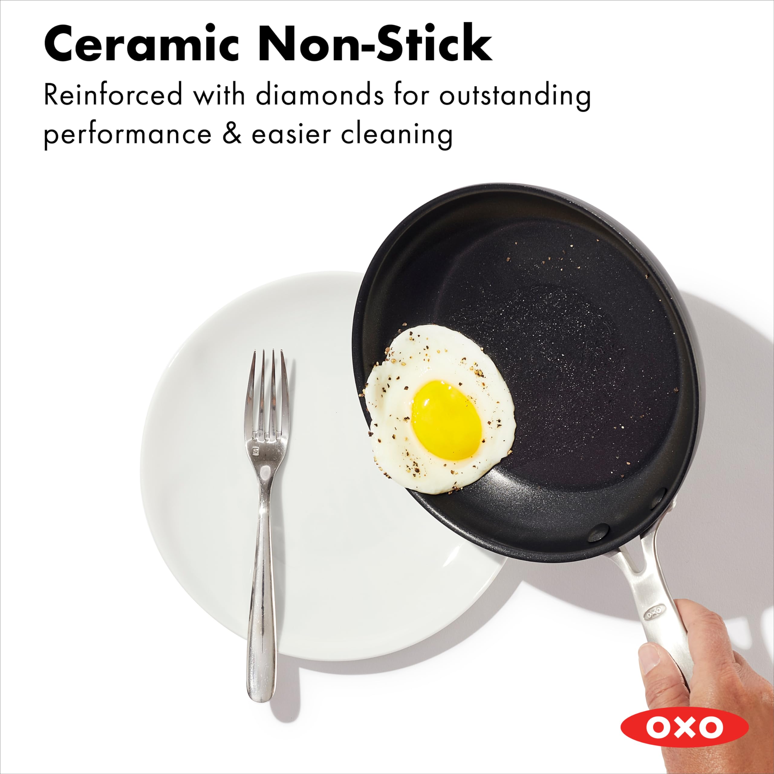 OXO 10-inch pan close-up searing steak for fast, even browning