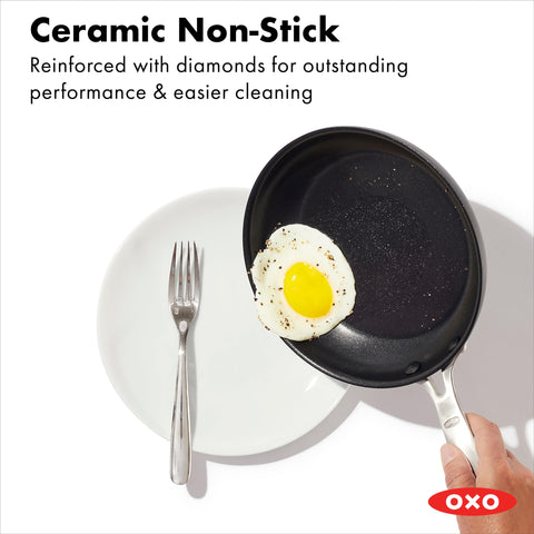 OXO 10-inch pan close-up searing steak for fast, even browning