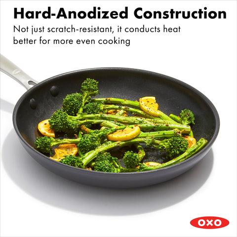 OXO stainless steel handle detail with rivets for secure grip