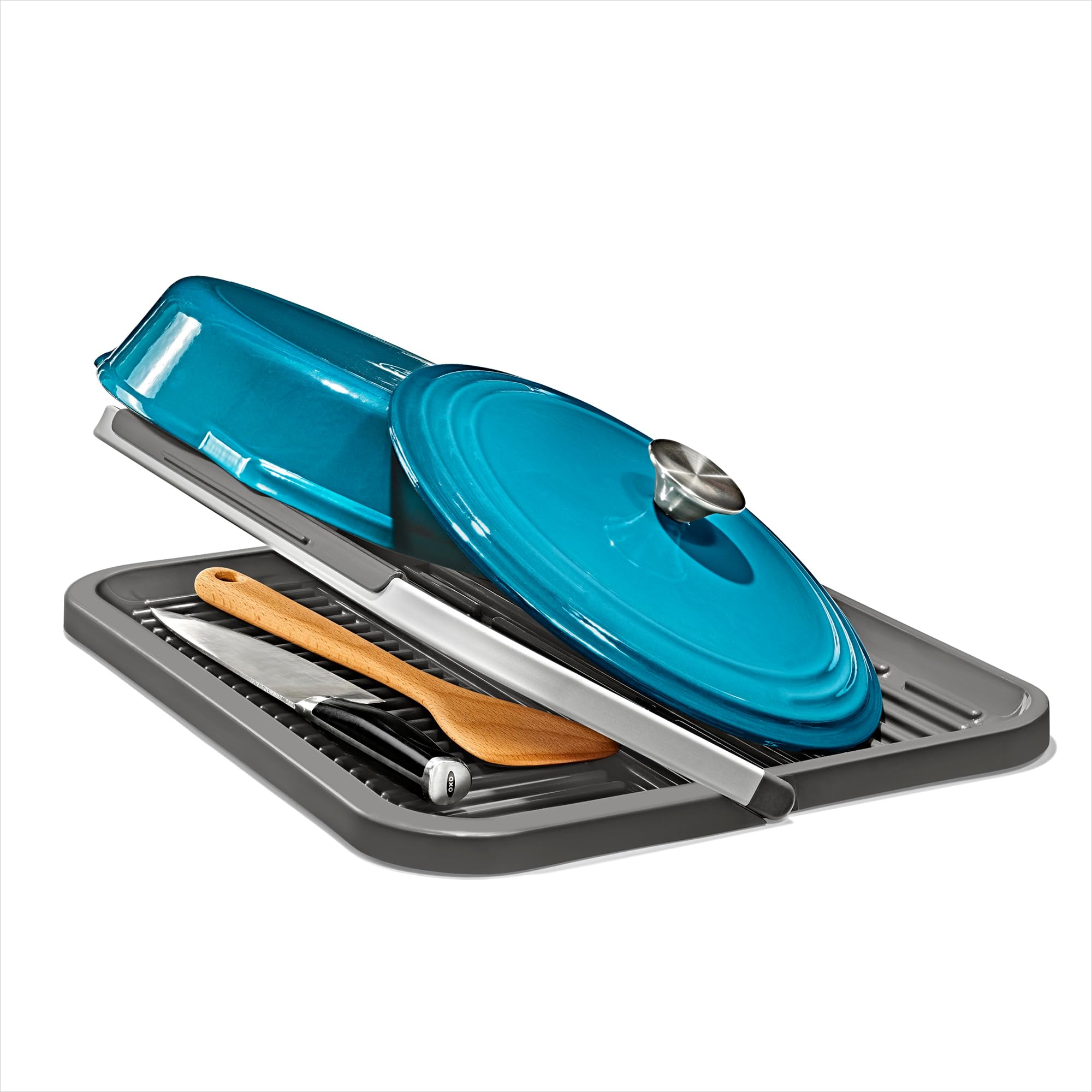 OXO folded flat for compact storage showing easy tuck-away benefit