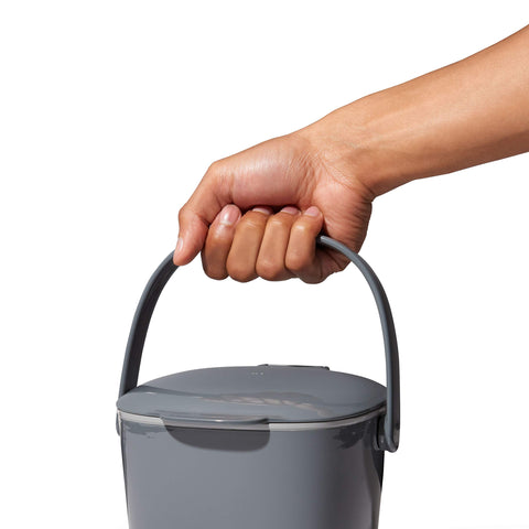 OXO Good Grips size comparison with apple to show compact 0.75 gal capacity benefit