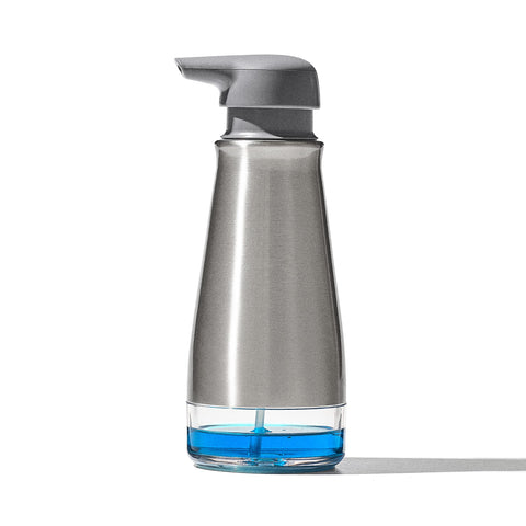 OXO Good Grips dispenser front view showing sleek stainless steel and stable base benefit