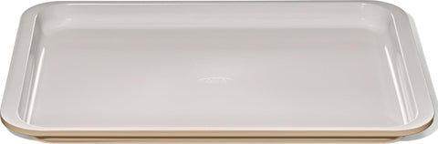 OXO Good Grips half sheet pan front view showing biscuit finish and sturdy build for even baking