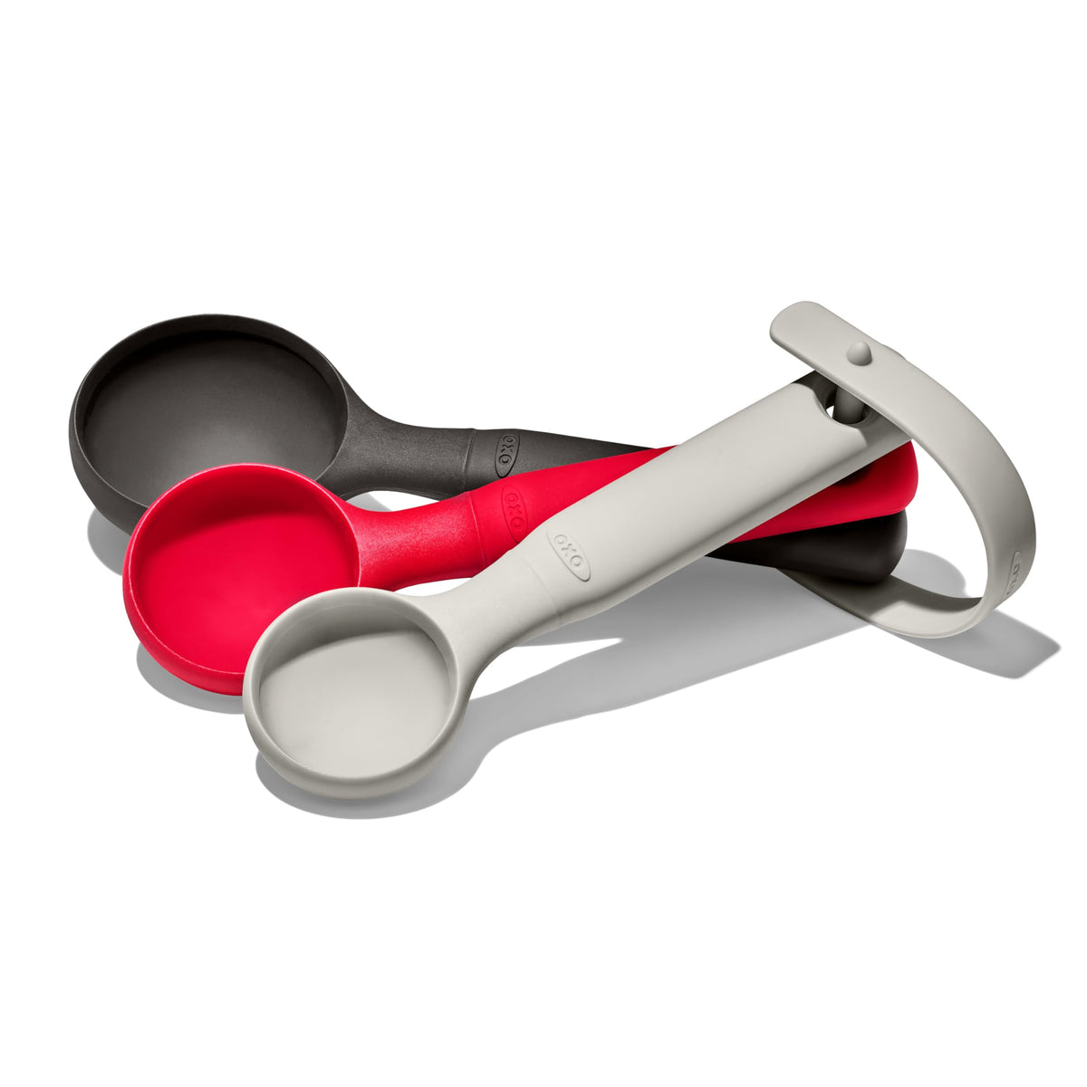 OXO Good Grips front view showing three scoops and storage loop, organized at a glance