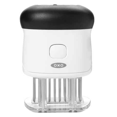 OXO front view of tenderizer showing whole white unit and safe storage benefit