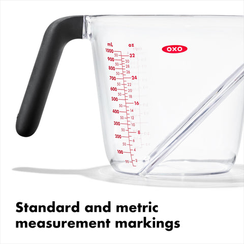 Detail of OXO non-slip handle and generous spout for controlled pouring