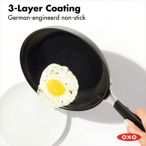 OXO Good Grips handle close-up showing silicone grip for comfortable control