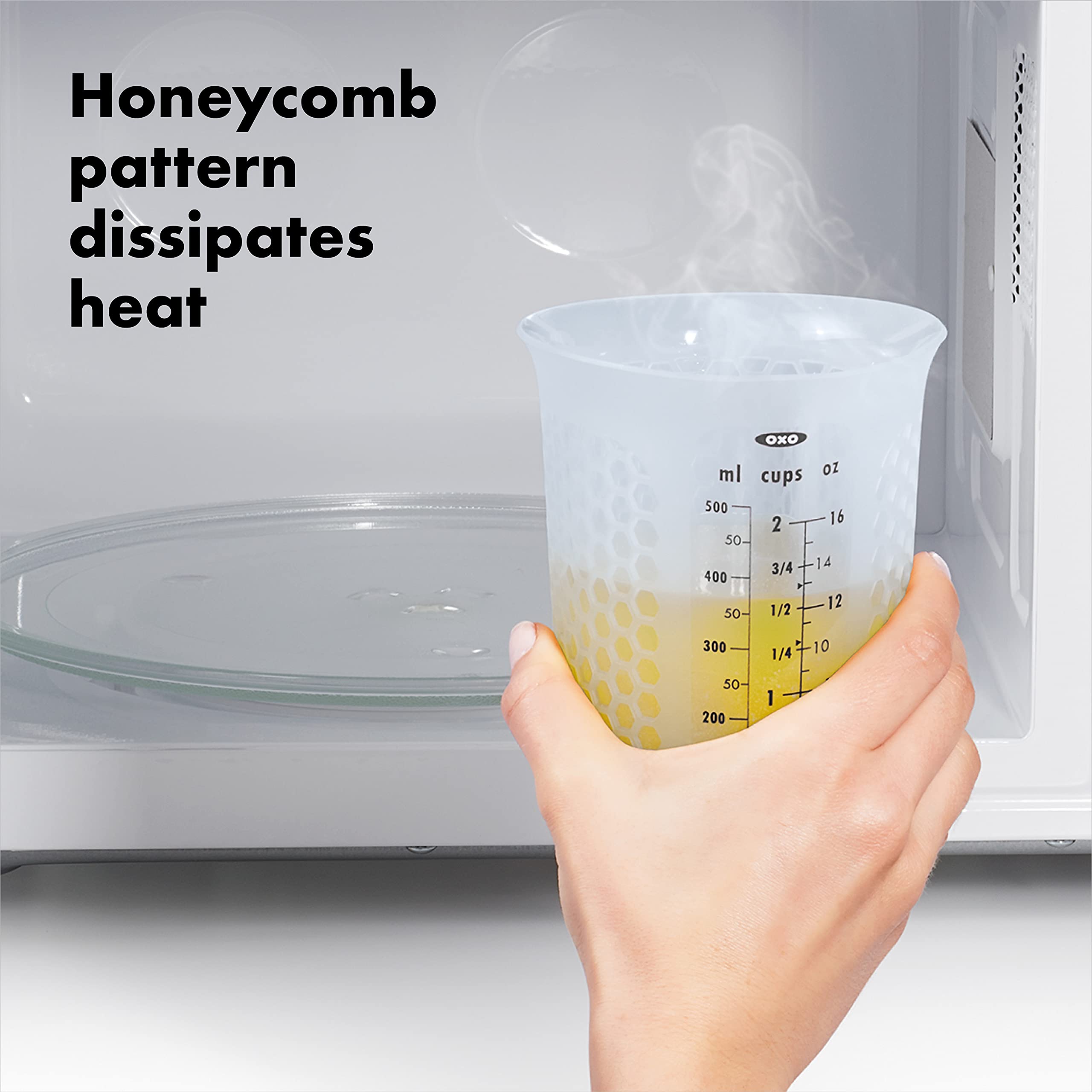 OXO Good Grips cups in microwave demonstrating safe melting convenience