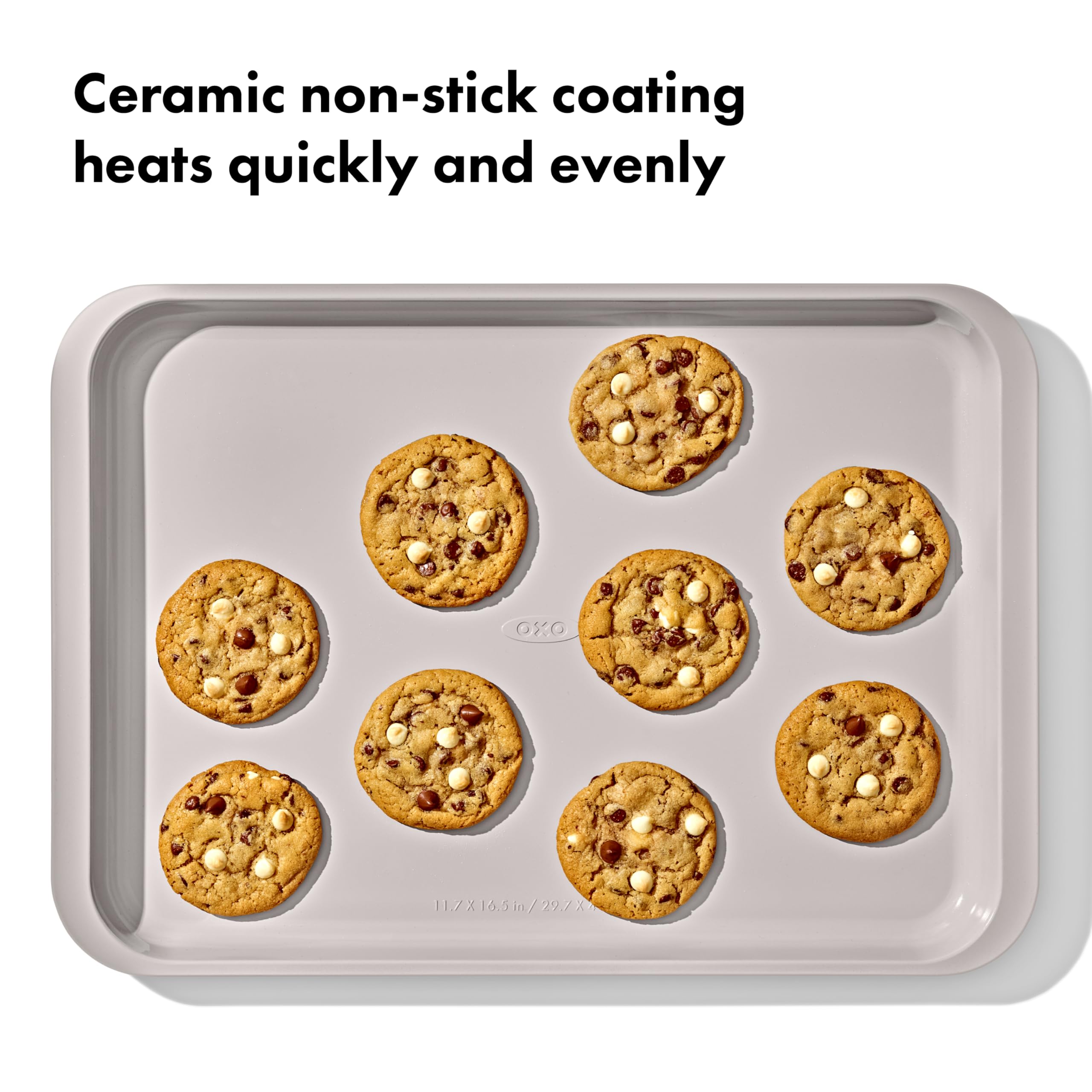 OXO Good Grips pan in oven with cookies showing even browning and quick release benefit