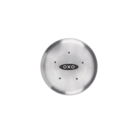 OXO Good Grips in use on a dining table seasoning food, quick-access seasoning benefit
