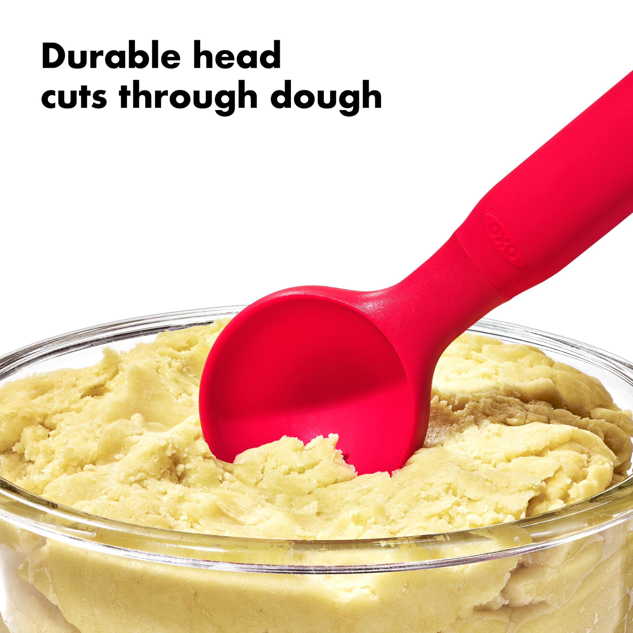 OXO Good Grips scooping cookie dough from bowl to tray for consistent portions