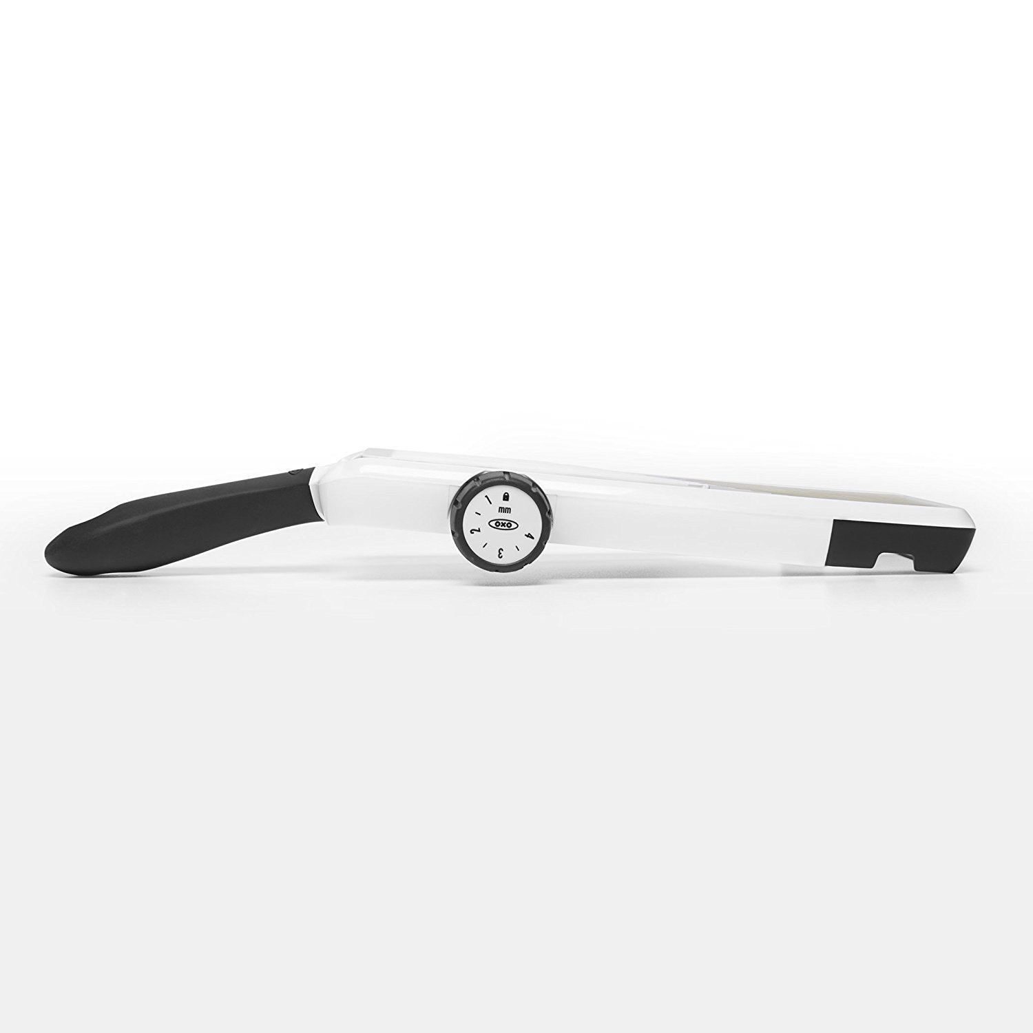 OXO mandoline blade detail highlighting sharp stainless-steel cutting performance