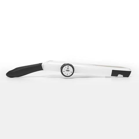 OXO mandoline blade detail highlighting sharp stainless-steel cutting performance