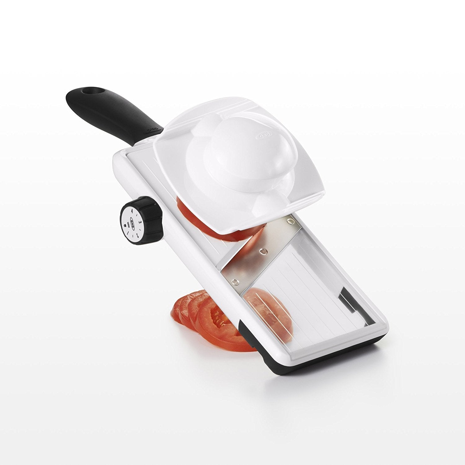 OXO mandoline folded with food holder attached for compact storage