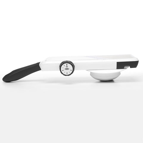 OXO mandoline next to apple showing scale and portioning accuracy