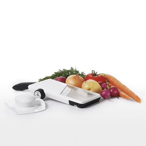 OXO mandoline slicing over bowl demonstrating direct-to-bowl convenience